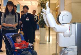 Honda's humanoid robot makes debut at Takashimaya